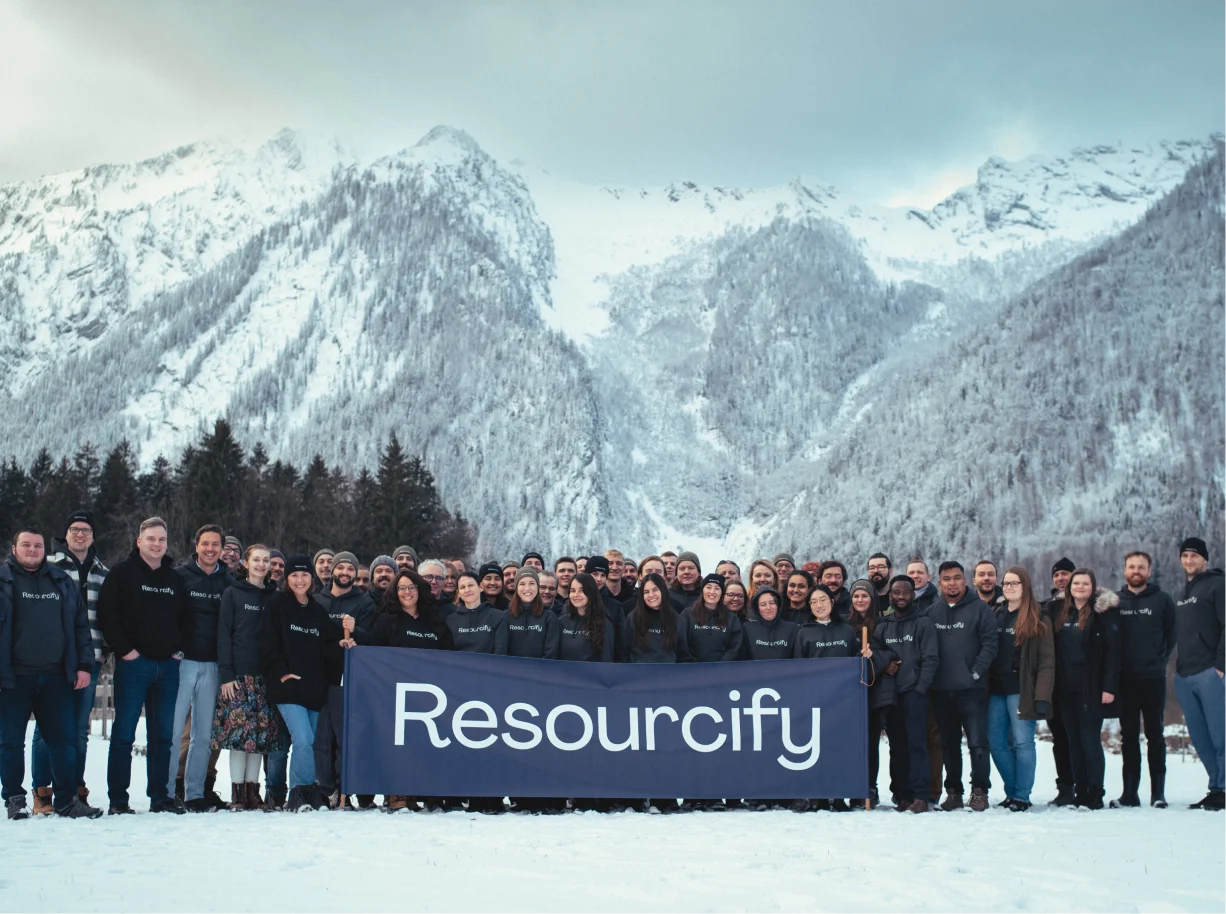 The Resourcify team together at a company offsite in the mountains